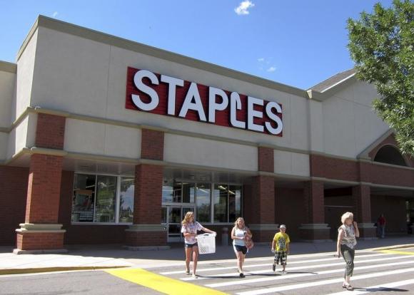 A family leaves the Staples store in Broomfield